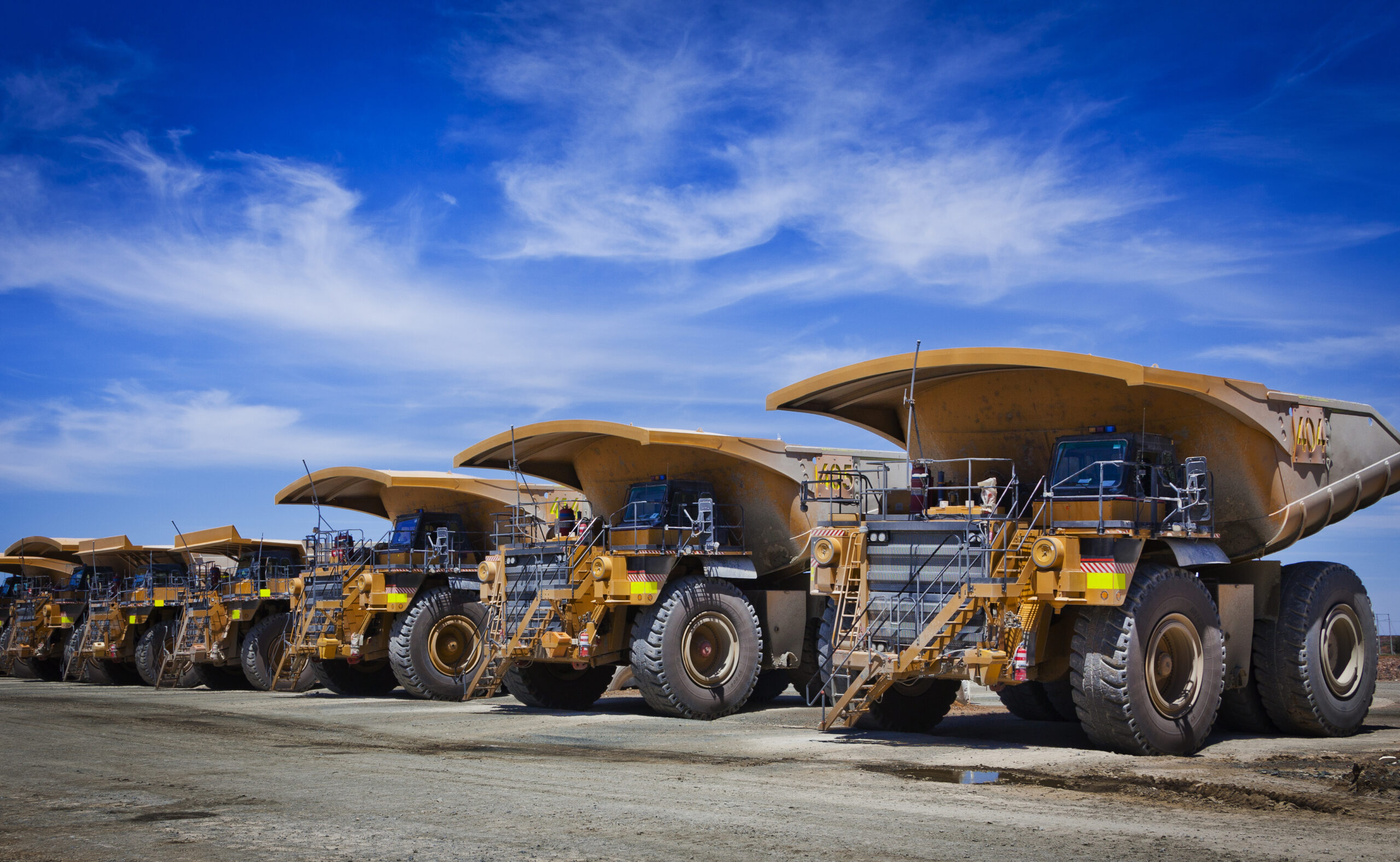 A fleet of haul trucks