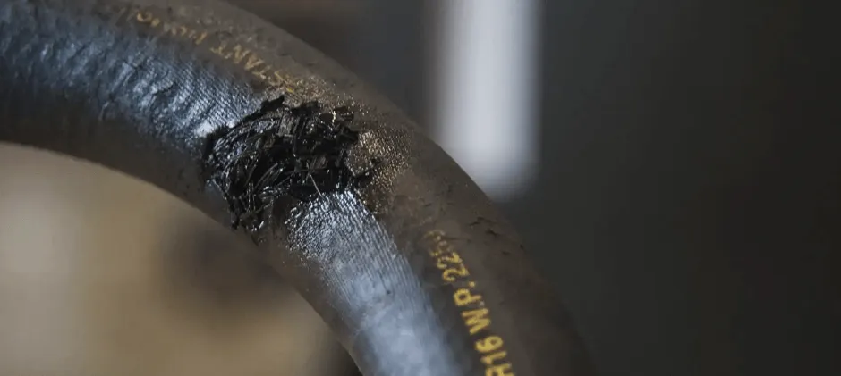 Broken/damaged hydraulic hose